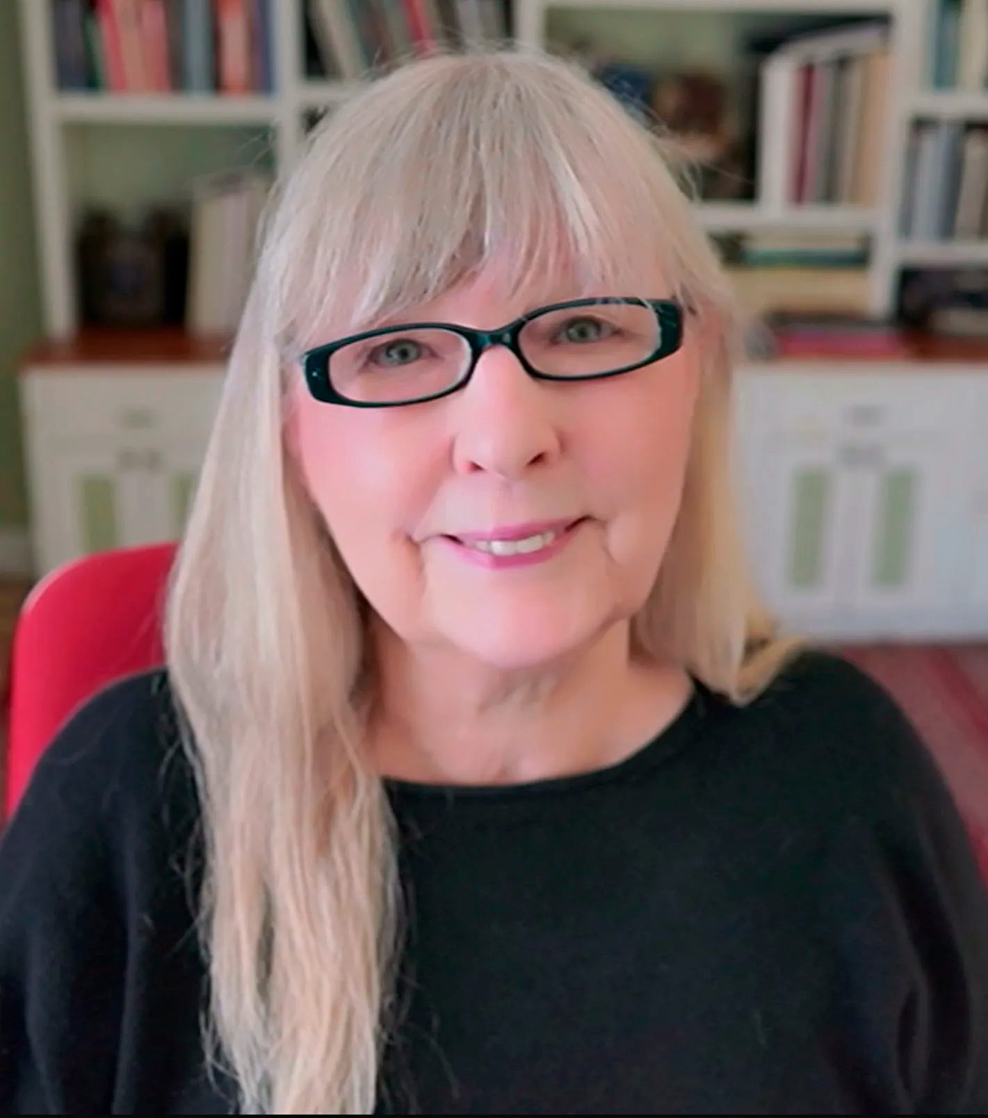 Image may contain Blonde Hair Person Accessories Glasses Adult Face Happy Head and Smile